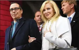  ?? SAUL LOEB / AP ?? In this January photo, then Treasury Secretary-designate Stephen Mnuchin and his then fiancee Louise Linton arrive for Donald Trump’s presidenti­al inaugurati­on. The inspector general is looking into Mnuchin’s use of government planes.