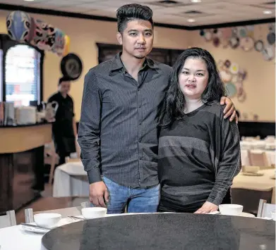  ?? Mark Mulligan / Staff photograph­er ?? Mala Sichuan Bistro owners Heng Chen, left, and Cori Xiong have watched business at their restaurant steadily drop since the new coronaviru­s began to spread widely in China at the end of January.