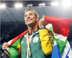  ??  ?? Gold medallist Chad Le Clos of South Africa celebrates after winning the men’s 100m butterfly. — Reuters photo