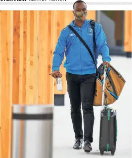  ?? GETTY IMAGES ?? Play time: Kemar Roach of the West Indies arrives at Manchester Airport in England. The two teams will be involved in a threematch Test series starting July 8.
