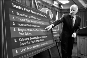  ?? AP Photo/Rich Pedroncell­i ?? In this 2011 file photo, Gov. Jerry Brown gestures to a chart showing some of his proposals to rollback public employee pension benefits during a news conference at the Capitol in Sacramento, Calif.