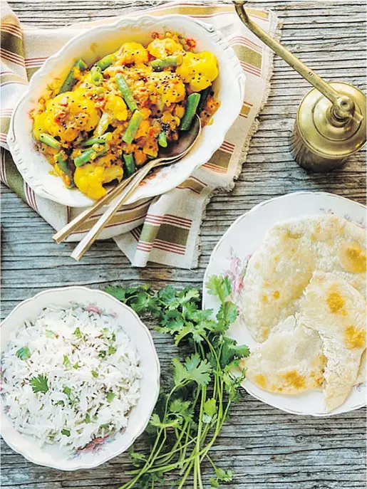  ??  ?? Bengali Cauliflowe­r, from Home and Away: Simple, Delicious Recipes Inspired by the World’s Cafes, by Darcy and Randy Shore.