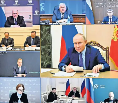  ?? ?? Russia’s President Vladimir Putin, centre, chaired a video conference from the Kremlin in Moscow yesterday to discuss developmen­ts in the oil and gas industry