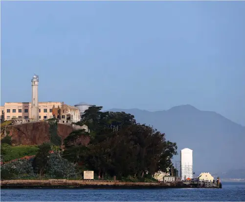  ?? ARIC CRABB/STAFF ?? Above, Alcatraz Island has housed a Civil War-era fort, a military prison and a federal penitentia­ry, which closed in 1963.