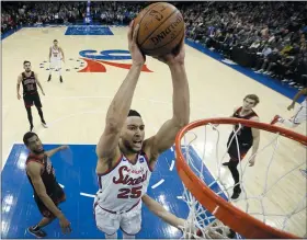  ?? MATT SLOCUM - STAFF, AP ?? Philadelph­ia 76ers’ Ben Simmons goes up for a dunk during the first half of an NBA basketball game against the Chicago Bulls, Friday in Philadelph­ia.