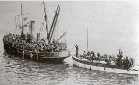  ?? Associated Press file ?? British soldiers are packed on a tug and a small powerboat as they evacuate Dunkirk, France, in June 1940.