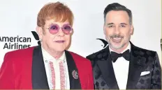  ??  ?? El anfitrión Elton John y su marido, el cineasta David Furnish.