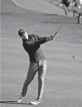  ?? [AP PHOTO] ?? Jordan Spieth follows his shot from the third fairway of the Pebble Beach Golf Links during the final round of the AT&T Pebble Beach National Pro-Am on Sunday in Pebble Beach, Calif.