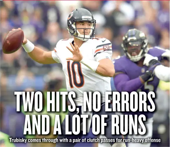  ?? | GAIL BURTON/ AP ?? Quarterbac­k Mitch Trubisky ( 8- for- 16 passing, 113 yards; four carries, 32 yards) had a critical completion to KendallWri­ght on a third- down play in overtime.