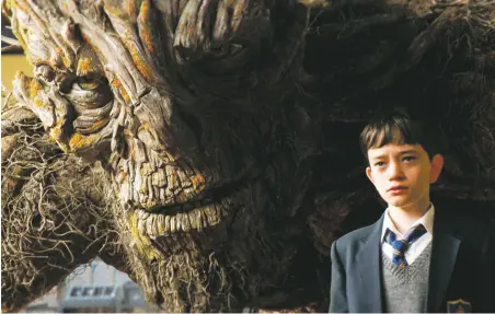  ??  ?? Branch manager: Conor O’Malley in A Monster Calls, at Regal DeVargas and Violet Crown