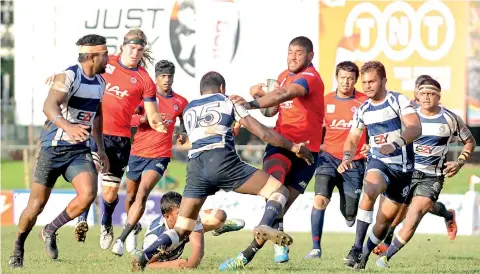  ??  ?? CR third row forward Omalka Gunaratne barges through the Police defence - Pic by Amila Gamage