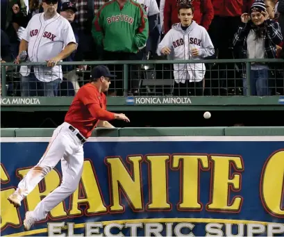  ?? NAncy LAnE / HErALd StAFF ?? FORTUNATE HOP: Right fielder Hunter Renfroe watches as a ground-rule double off the bat of Tampa Bay’s Kevin Kiermaier bounces over the bullpen wall during the 13th inning last night.