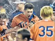  ?? Timothy D. Easley Associated Press ?? DAVID OLMEDO-BARRERA leads Fullerton in home runs, including a big one in the super regional.