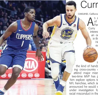  ??  ?? Golden State Warriors guard Stephen Curry (right) dribbles around Los Angeles Clippers guard Jawun Evans during the second half of their NBA game in Los Angeles on Saturday.