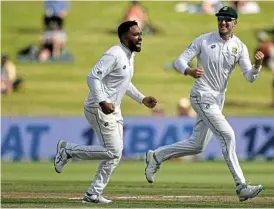  ?? /Hannah Peters/Getty Images ?? Mr Delivery: Dane Piedt and Proteas skipper Neil Brand celebrate the wicket of Will Young in Hamilton on Wednesday.