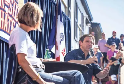  ?? LILY SMITH/THE REGISTER ?? GOP presidenti­al candidate Ron DeSantis speaks during Gov. Kim Reynolds’ Fair-Side Chat during the Iowa State Fair in Des Moines on Aug. 12.