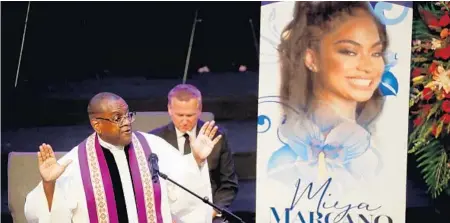  ?? SUSAN STOCKER/SOUTH FLORIDA SUN SENTINEL ?? Pastor Norman Hemming speaks during the funeral service for Miya Marcano on Oct. 14 at Cooper City Church of God in Cooper City. Marcano, a college sophomore from Pembroke Pines, was found murdered near her apartment complex in Orlando on Oct. 2.