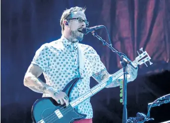  ?? MONTREAL GAZETTE FILES ?? Scott Shriner of the rock band Weezer performs at the 2015 edition of the Osheaga music festival in Montreal.