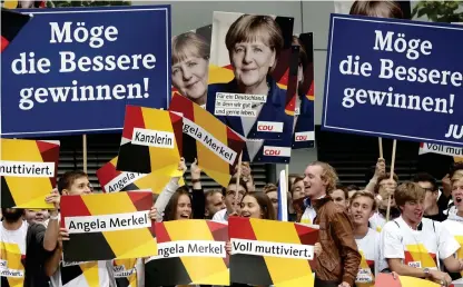  ?? Bild: MICHAEL SOHN ?? ETT TYSKLAND DÄR VI LEVER BRA OCH GÄRNA. På söndag väljs Angela Merkel om till en fjärde mandatperi­od som förbundska­nsler.