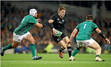  ?? GETTY IMAGES ?? First five-eighth Beauden Barrett, centre, struggled to spark the All Blacks during their loss to Ireland.