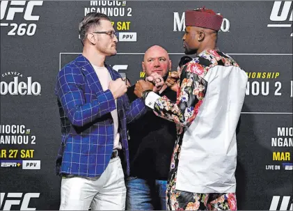  ?? Jeff Bottari Zuffa LLC ?? Heavyweigh­t Stipe Miocic, left, will fight Las Vegas resident Francis Ngannou in the main event at Saturday’s UFC 260 at the Apex.