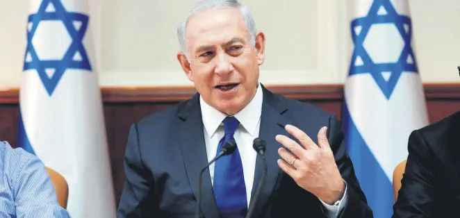  ??  ?? Israeli Prime Minister Benjamin Netanyahu attends the weekly cabinet meeting at his office in Jerusalem, Nov. 12.
