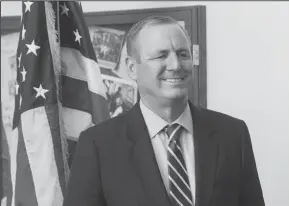  ?? MARTY BICEK/MODESTO BEE FILE PHOTOGRAPH ?? Congressma­n Jeff Denham waits to take photos with new U.S. citizens during a Naturaliza­tion Ceremony at the Ceres Community Center on July 31.