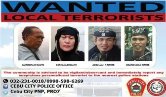  ??  ?? Cayamora Maute – who is arrested June 6, 2017 in Davao City – and one of his wives and two sons appear on this wanted terrorists poster.