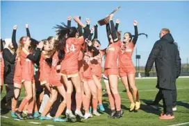  ?? ?? Fallston players celebrate with their trophy following a 3-2 win over South Carroll in the Class 1A state championsh­ip game on Saturday at Loyola University’s Ridley Athletic Complex.
BRIAN KRISTA/BALTIMORE SUN MEDIA