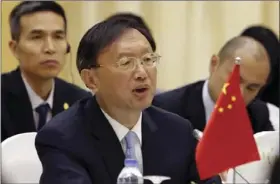  ??  ?? In this June 27 file photo, Chinese State Councilor Yang Jiechi speaks during a cooperatio­n conference with Vietnamese Foreign Minister Pham Binh Minh in Hanoi, Vietnam. Yang will meet with U.S. high-ranking officials becoming the first senior Chinese...