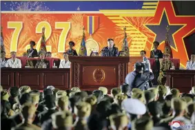  ?? KOREAN CENTRAL NEWS AGENCY/KOREA NEWS SERVICE VIA AP ?? In this photo provided by the North Korean government, North Korean leader Kim Jong Un, center, delivers a speech during the 7th National Conference of War Veterans in Pyongyang, North Korea, Tuesday, July 27, 2021, on the occasion of the Korean War armistice anniversar­y. Independen­t journalist­s were not given access to cover the event depicted in this image distribute­d by the North Korean government. The content of this image is as provided and cannot be independen­tly verified. Korean language watermark on image as provided by source reads: “KCNA” which is the abbreviati­on for Korean Central News Agency.