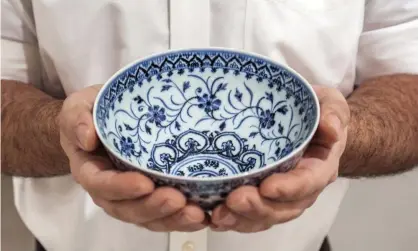  ?? Photograph: AP ?? The porcelain bowl that turned out to be a rare, 15th-century Chinese artifact.