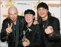  ?? GETTY IMAGES JO HALE/ ?? Heavy metal band The Scorpions, including members Rudolf Schenker (from left), Klaus Meine and Matthias Jabs, will play with Megadeth tonight at the BB&T Center in Sunrise. 1.