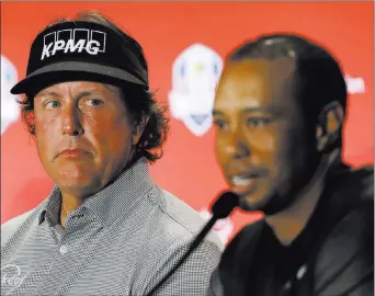  ?? Matt Slocum ?? The Associated Press Phil Mickelson, left, and Tiger Woods are set to attend a news conference Nov. 20 at Shadow Creek Golf Course to promote their pay-per-view match scheduled for Nov. 23.