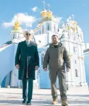  ?? EVAN VUCCI/AP ?? President Joe Biden walks with Ukrainian President Volodymyr Zelenskyy outside St. Michael’s Cathedral in Kyiv.