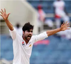  ?? — AFP ?? KINGSTON: Pakistan’s Mohammad Amir unsuccessf­ully appeals for LBW on day two of the first Test match between West Indies and Pakistan at the Sabina Park.