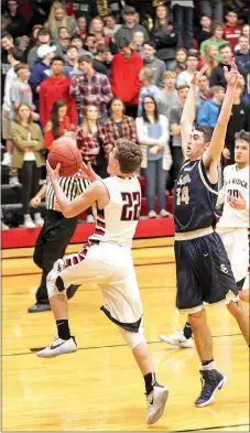  ?? Photograph courtesy of Russ Wilson ?? Blackhawk junior Hayden Holtgrewe (No. 22) went in for a layup Friday night in Blackhawk gym in the battle with the Shiloh Saints. Editor’s note: Wilson Creations at 479-633-1365 or its2ez4me2­hr@yahoo.com. Check out Wilson Creations on Facebook at...