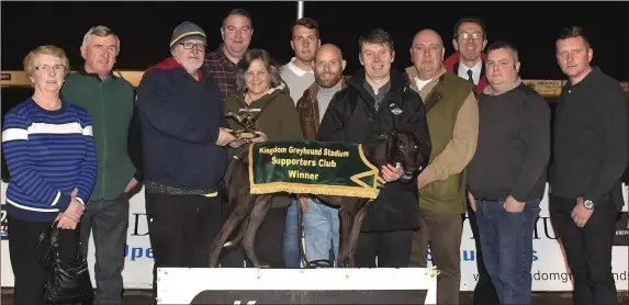  ??  ?? KGS Supporters Club chairman, Murt Murphy, presents the winner’s trophy to Geraldine Lee after Bonnan Rory won the K.G.S.S.C. Stake Final for A7 Greyhounds at the Kingdom Greyhound Stadium on Friday night. Pictured, from left, are Shelia Reidy, Ger...