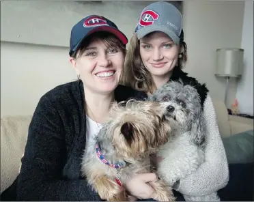  ?? PIERRE OBENDRAUF/ THE GAZETTE ?? Alex Galchenyuk’s mother, Inna, left, and sister, Anna, with their two dogs, were in town for the 18-year-old’s first NHL game.