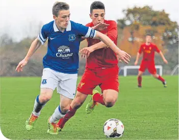  ??  ?? George Green in action for Everton during an Under-18 Merseyside derby in 2013