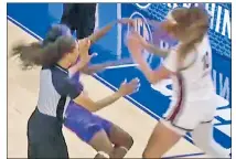  ?? ESPN ?? OH BROTHER: South Carolina’s Kamilla Cardoso (right) knocks over LSU’s Flau’jae Johnson as tempers flared late in the SEC title game. When it was over 11 players were ejected and a man, identified as Johnson’s brother, was taken off the court in handcuffs.