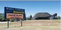  ??  ?? One stop along the way was to see “the world’s largest turtle,” made entirely from tire rims, in North Dakota.