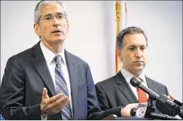  ?? RICHARD GRAULICH / THE PALM BEACH POST 2016 ?? Assistant State Attorney Al Johnson (left) and State Attorney Dave Aronberg, shown here in December, spoke to a Florida House subcommitt­ee Thursday about the county’s Sober Home Task Force recommenda­tions.