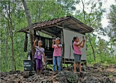  ?? AFP ?? The coronaviru­s pandemic has forced technology to reach out even to the most remote areas, and video services have emerged as an integral investment to keep operations flowing, from SMES to large corporates and entertainm­ent to education. —