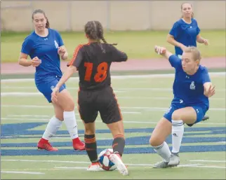  ?? Herald photo by Dale Woodard ?? As they get ready for the Canada West season, the University of Lethbridge Pronghorns women’s soccer team hosted the Calgary Blizzard Friday afternoon at the University of Lethbridge Stadium. The Horns played the Lethbridge College Kodiaks women’s team on Thursday, winning 3-1.