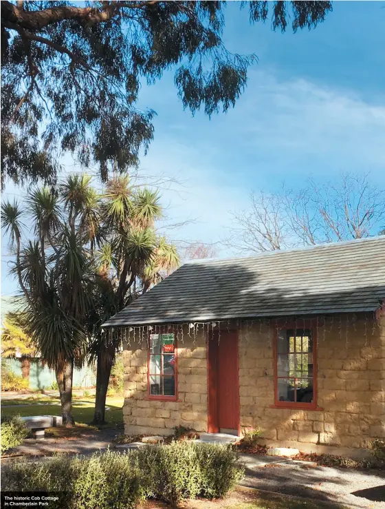  ??  ?? The historic Cob Cottage in Chamberlai­n Park