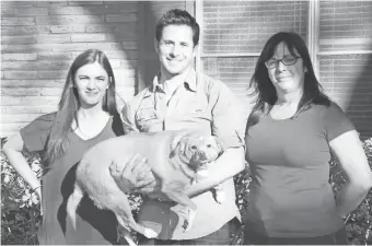  ?? ANIMAL PLANET ?? Host Travis Brorsen with Lisa Engel, her daughter Madison, and their dog, Gracie, on Animal Planet’s upcoming My Fat Pet.