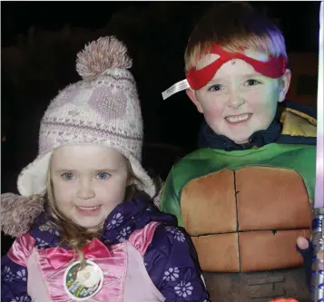  ??  ?? Finn and Aoife Gilmore at the switching on of the Christmas lights at Bray Civic Plaza.