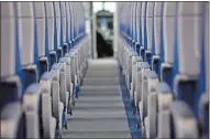  ?? BLOOMBERG PHOTO BY LUKE MACGREGOR ?? Airline seats line the aisle of a Boeing 737 Max aircraft.