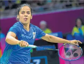  ??  ?? Saina Nehwal lost to Michelle Li in the first singles as India went down 14 to Canada.